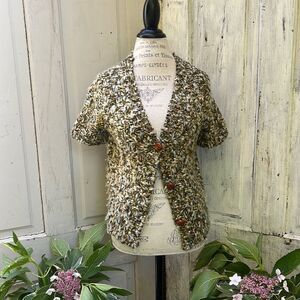 Hand knit by Dollie at ANTHROPOLOGIE green short sleeve cardigan. Size M